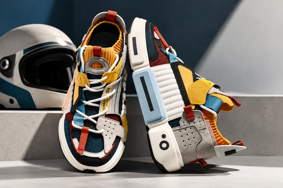 Colorful sneakers in front of a helmet
